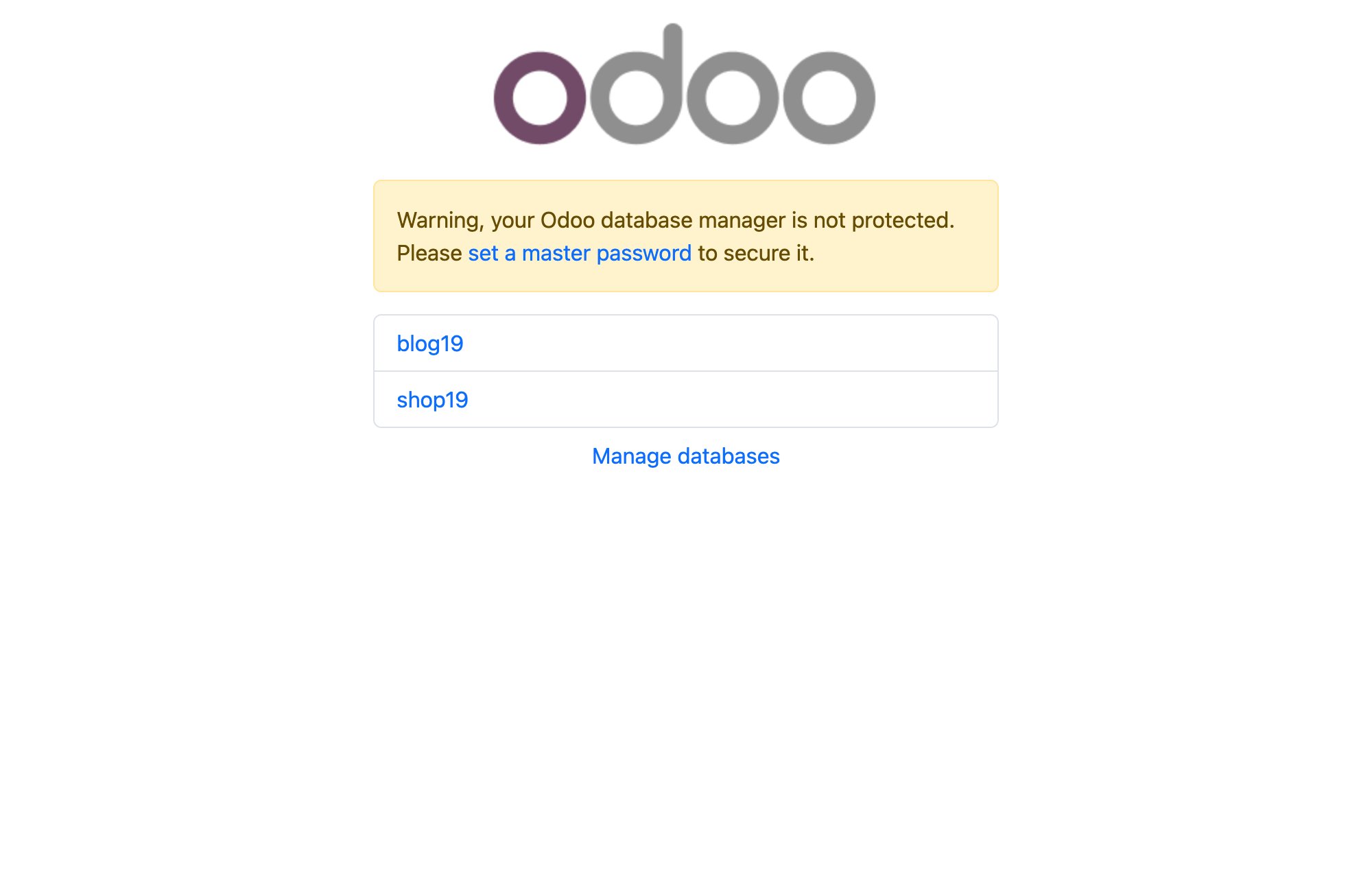 Ảnh chụp thật trang chọn database của Odoo 19: logo Odoo ở trên, một khung cảnh báo màu vàng ghi Warning your Odoo database manager is not protected please set a master password to secure it, bên dưới là danh sách hai database blog19 và shop19 dạng link bấm được, và dòng Manage databases để vào trình quản lý database